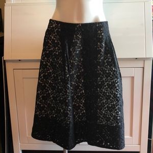 Black lace over ivory skirt
